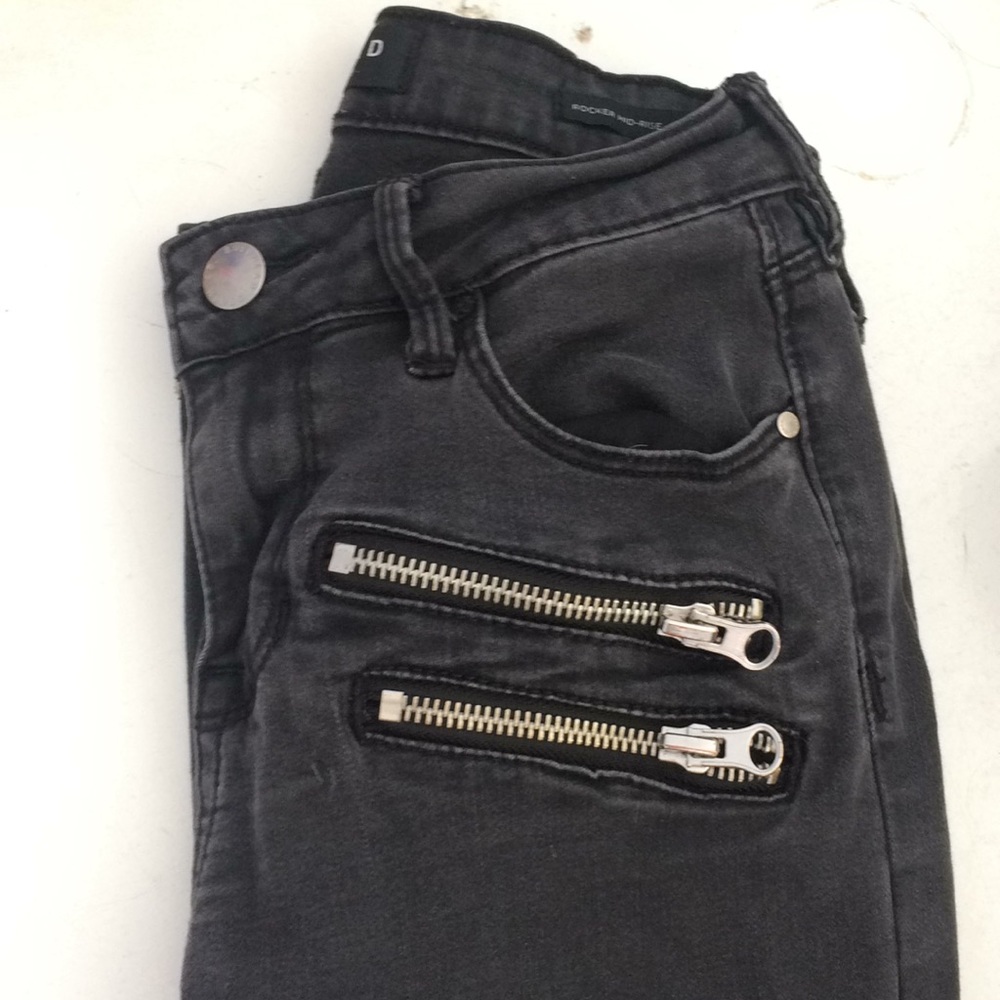 grey-black jeans with zippers